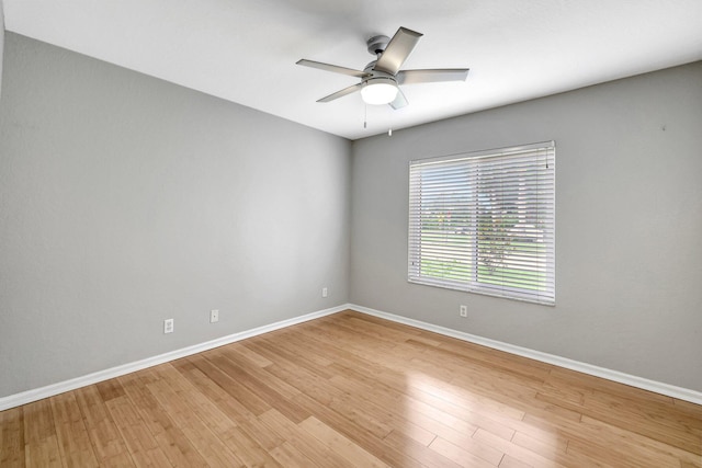 unfurnished room featuring ceiling fan and light hardwood / wood-style floors