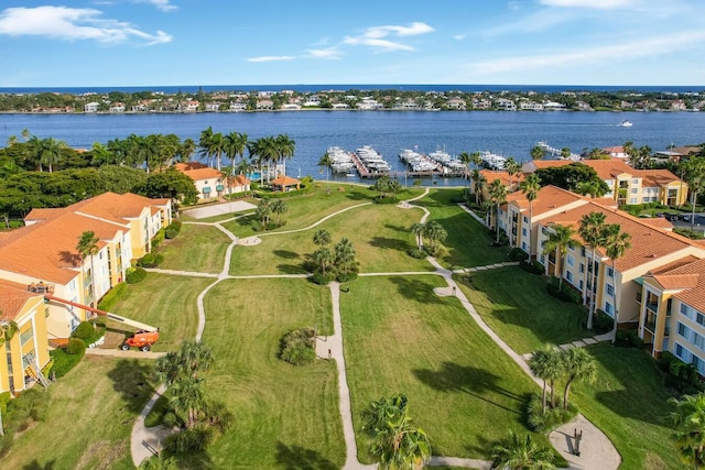 birds eye view of property featuring a water view