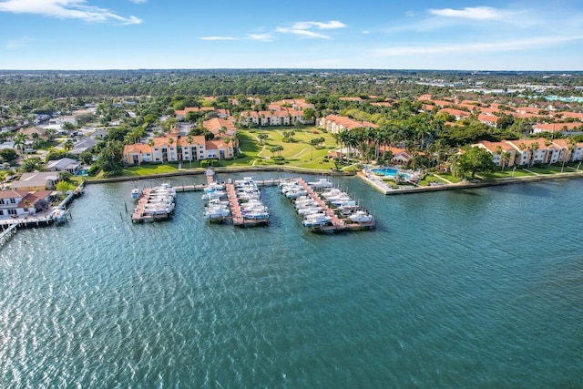 bird's eye view with a water view and a residential view