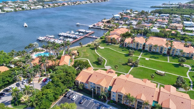 drone / aerial view with a water view