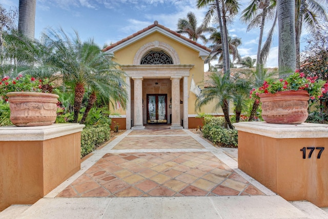 property entrance with a patio area