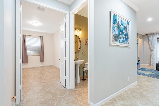 hallway with crown molding