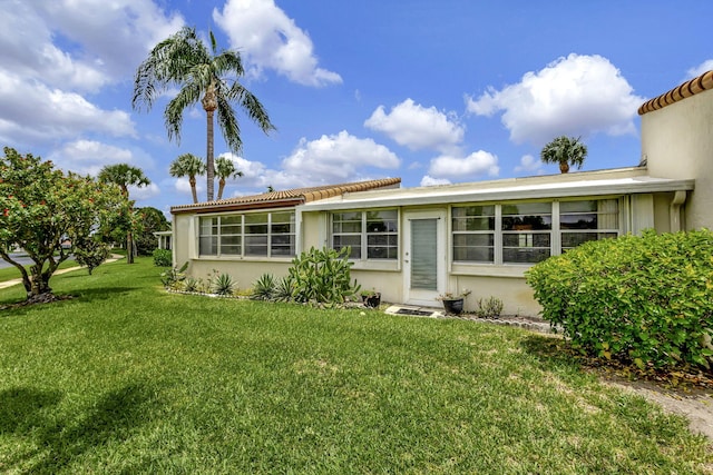 exterior space featuring a yard