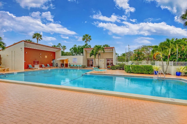 view of swimming pool featuring a patio