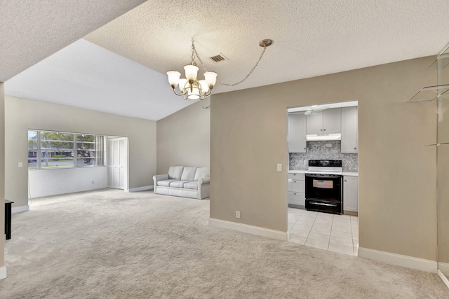 kitchen featuring black / electric stove, hanging light fixtures, light colored carpet, and an inviting chandelier