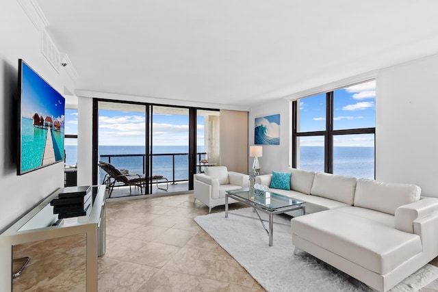 living room featuring floor to ceiling windows, a water view, light tile patterned floors, and crown molding