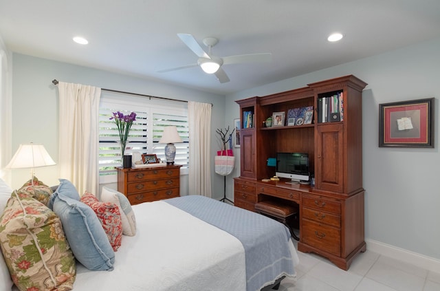 tiled bedroom with ceiling fan