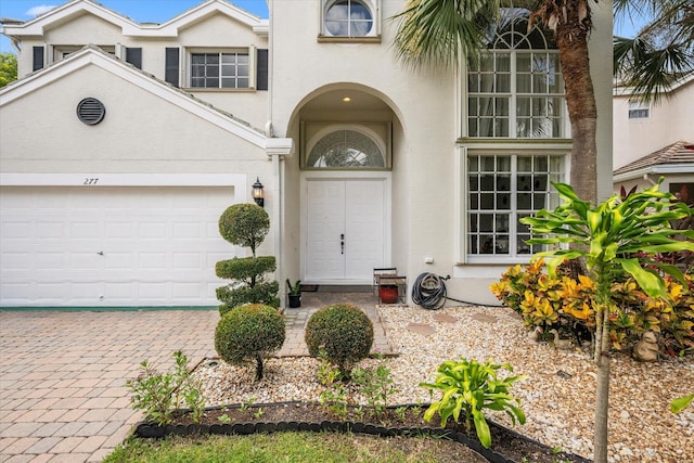 view of front of property featuring a garage