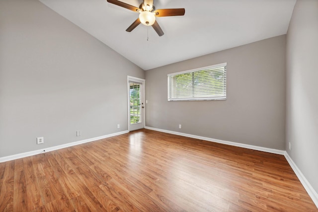 unfurnished room featuring lofted ceiling, ceiling fan, and light hardwood / wood-style flooring