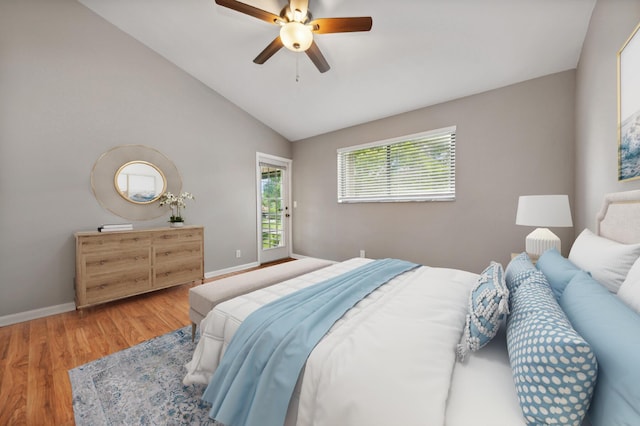 bedroom featuring ceiling fan, lofted ceiling, and hardwood / wood-style flooring