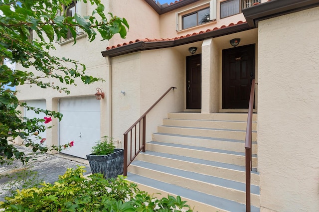 property entrance featuring a garage