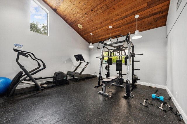 exercise area featuring high vaulted ceiling, a wealth of natural light, and wooden ceiling