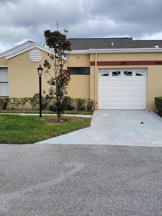 ranch-style house with a garage