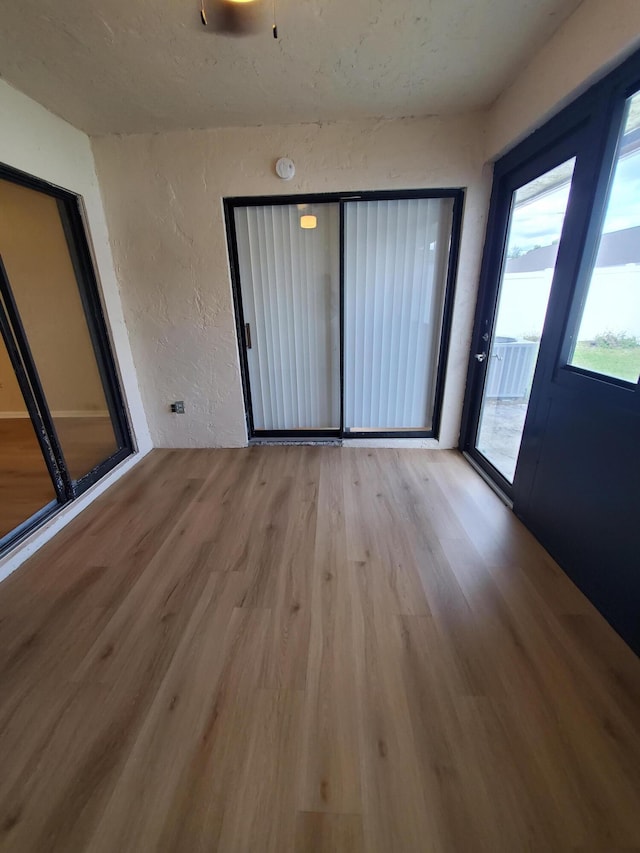 interior space with light hardwood / wood-style flooring