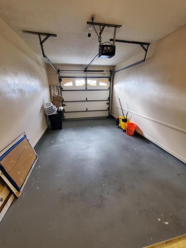 garage featuring a garage door opener