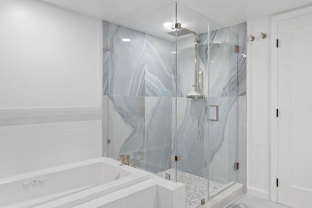 bathroom with independent shower and bath