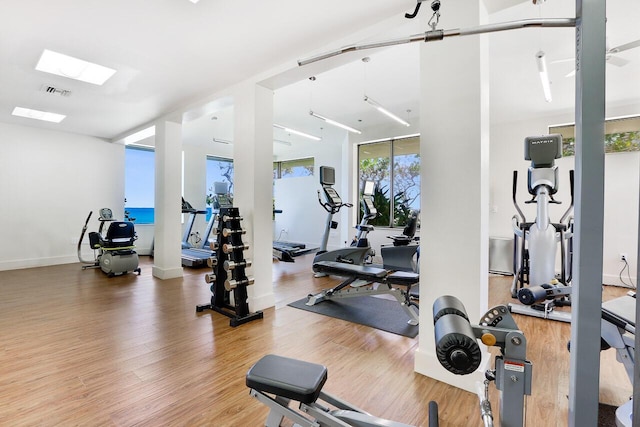 workout area featuring hardwood / wood-style flooring