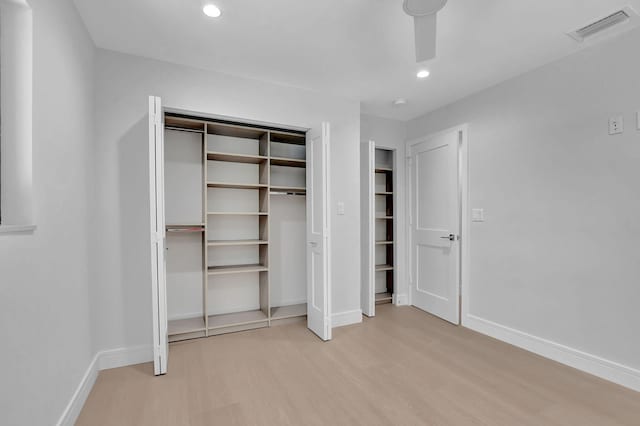 unfurnished bedroom featuring light wood-type flooring