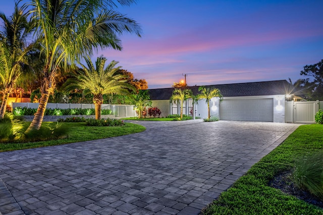 ranch-style house featuring a garage