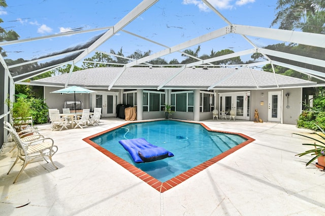 view of pool featuring a patio and a lanai