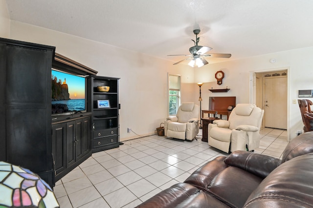 tiled living room with ceiling fan