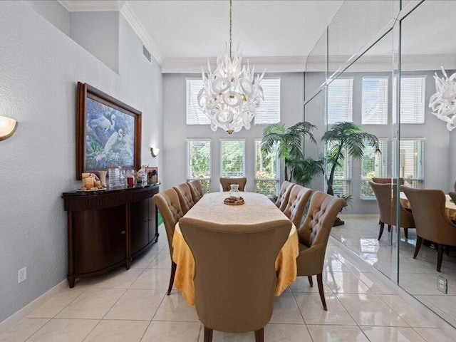 tiled dining area featuring a high ceiling, a notable chandelier, and crown molding