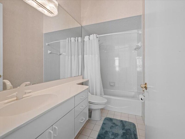 full bathroom with tile patterned floors, shower / bath combination with curtain, toilet, and vanity