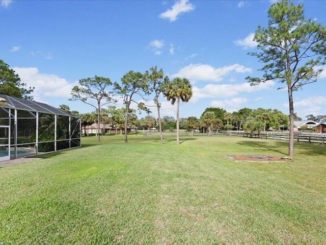 view of yard featuring a lanai