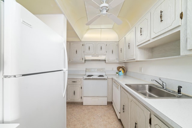 kitchen with white appliances, sink, vaulted ceiling, ceiling fan, and light tile patterned floors