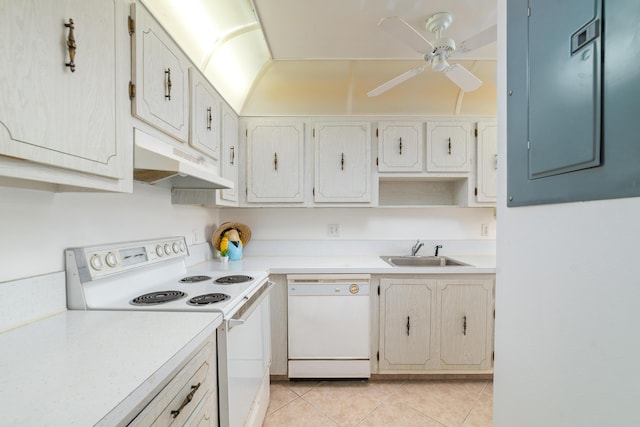 kitchen with ceiling fan, electric panel, sink, white appliances, and light tile patterned floors