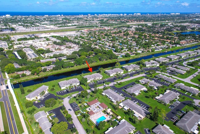 drone / aerial view featuring a water view