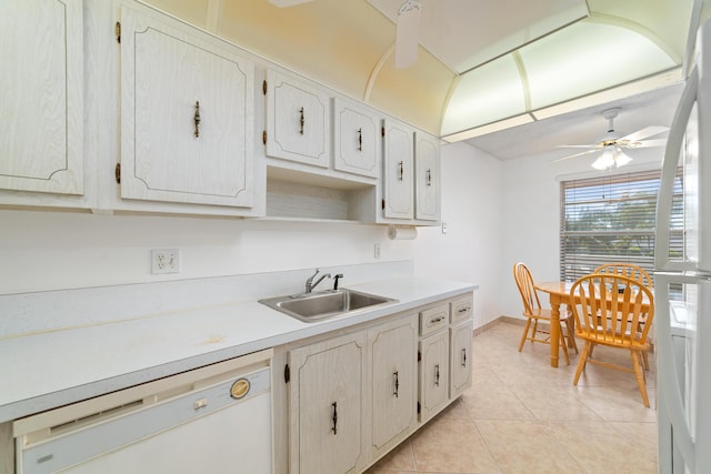 kitchen featuring ceiling fan, light tile patterned floors, sink, and white appliances