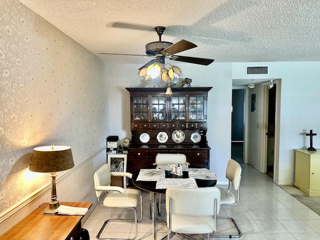 767 E High Point Dr E Unit C, Delray Beach, FL 33445 - dining area with a ceiling fan, light tile patterned floors, a textured ceiling, and wallpapered walls