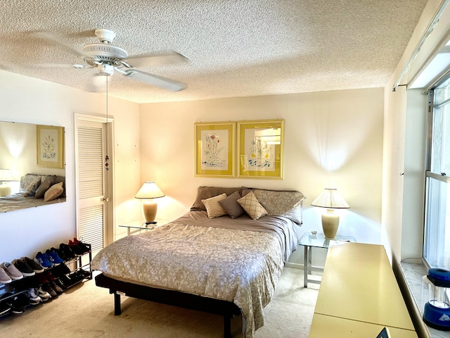 767 E High Point Dr E Unit C, Delray Beach, FL 33445 - carpeted bedroom with a textured ceiling and a ceiling fan