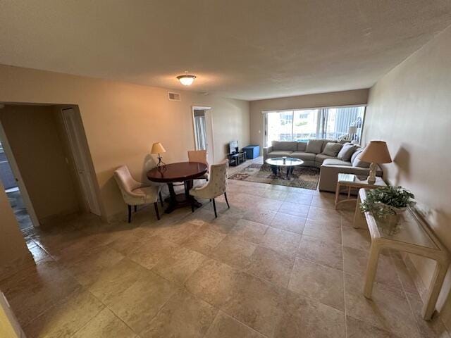 dining room with visible vents