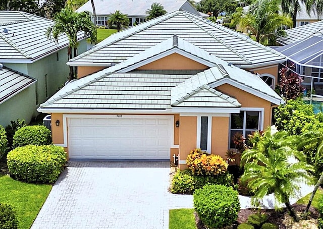 view of front of home with a garage