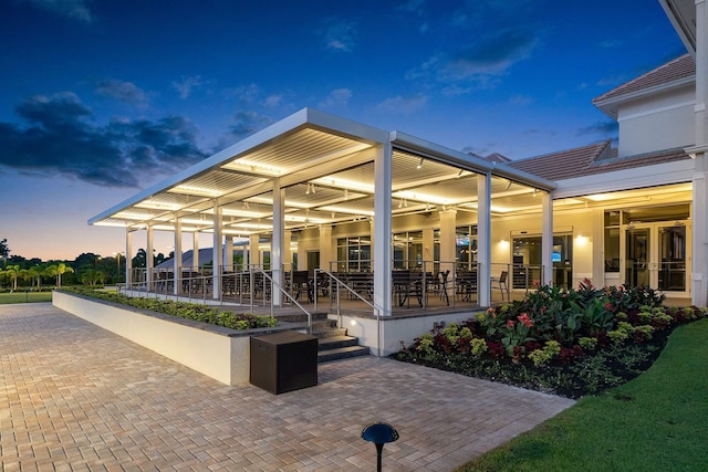 view of property's community with a patio area