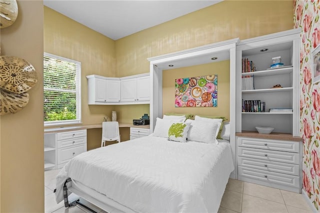 bedroom featuring light tile patterned floors