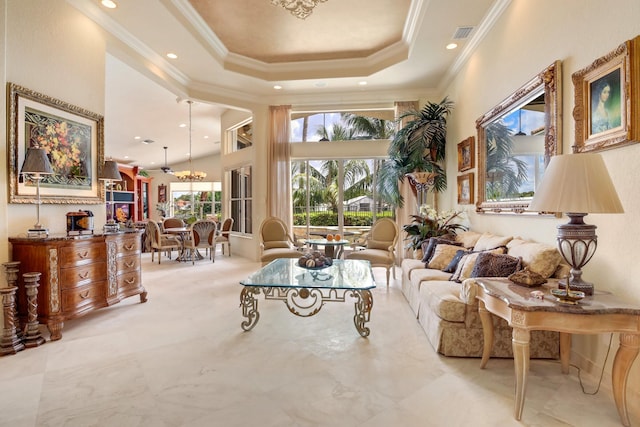 11420 Ohanu Cir, Boynton Beach, FL 33437 - living area with a towering ceiling, ornamental molding, a chandelier, recessed lighting, and a raised ceiling