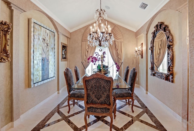 dining room with a chandelier and ornamental molding