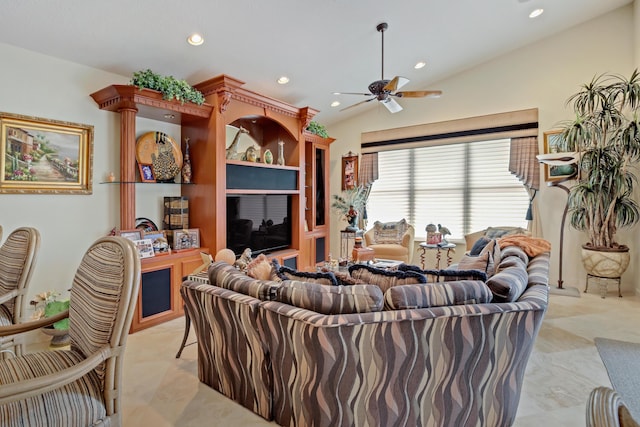 living room with ceiling fan and lofted ceiling