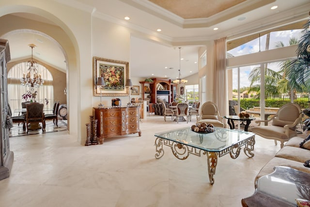 11420 Ohanu Cir, Boynton Beach, FL 33437 - living room featuring a chandelier, arched walkways, a towering ceiling, ornamental molding, and recessed lighting