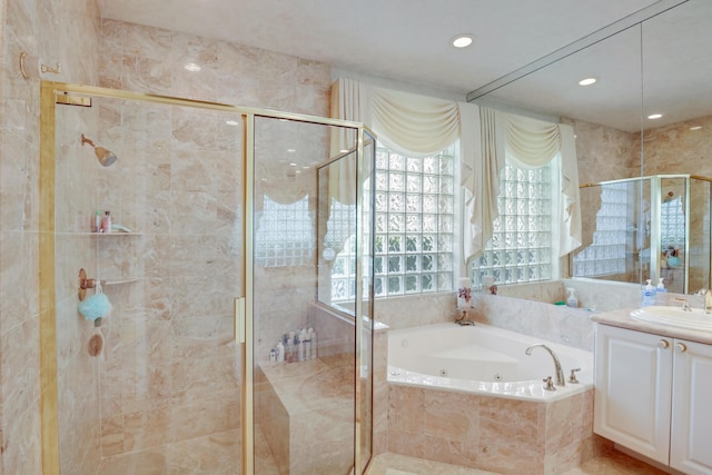 11420 Ohanu Cir, Boynton Beach, FL 33437 - bathroom featuring vanity, a jetted tub, a stall shower, and recessed lighting
