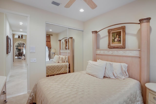 bedroom with a closet and ceiling fan