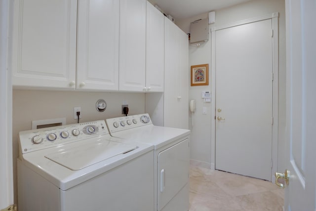 11420 Ohanu Cir, Boynton Beach, FL 33437 - laundry area featuring washing machine and clothes dryer and cabinet space