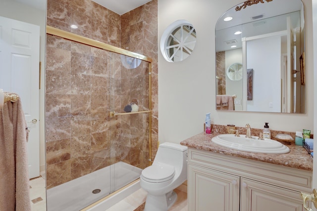 bathroom featuring a shower with door, vanity, and toilet