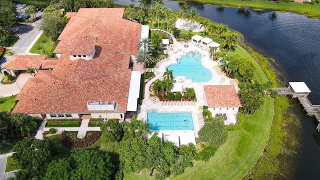 birds eye view of property featuring a water view