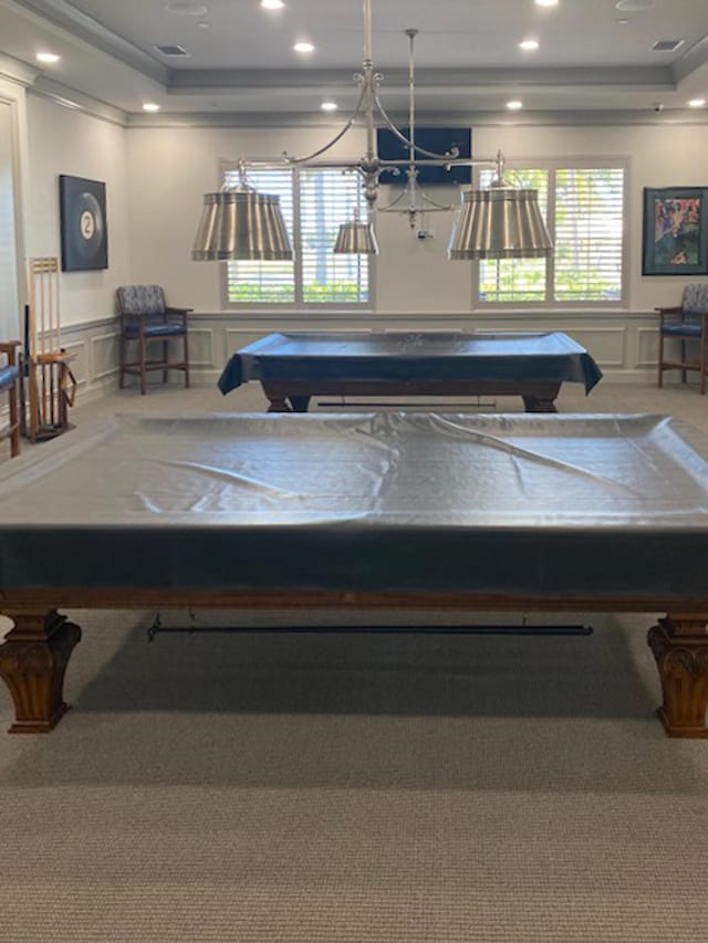 game room featuring carpet floors, a tray ceiling, and pool table