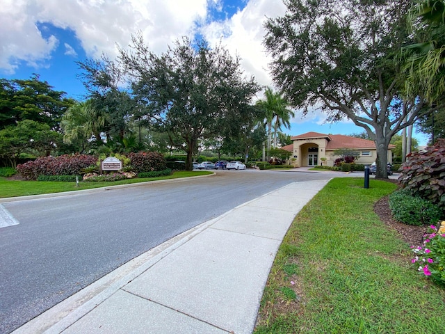 11420 Ohanu Cir, Boynton Beach, FL 33437 - view of asphalt road featuring curbs