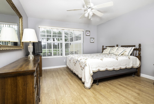 bedroom featuring wood-type flooring and ceiling fan